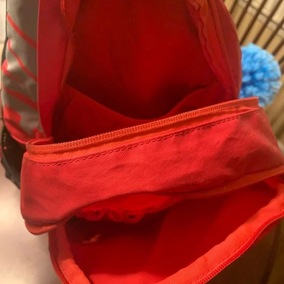 Nike backpack. Rarely used. Has 3 large pockets with smaller pockets inside. Nike backpack. Rarely used. Has 3 large pockets with smaller pockets inside.